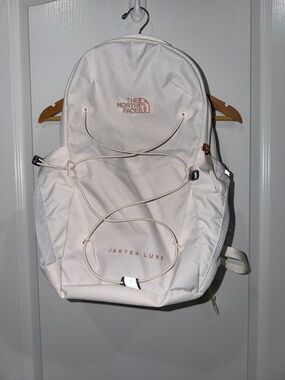 The North Face Jester Luxe Backpack in Cream with Rose Gold Accents